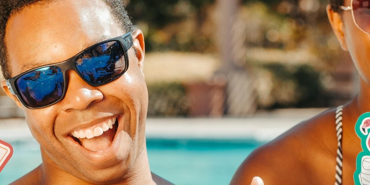 Residents enjoying the luxurious amenities of a master-planned community, such as a pool or green space.