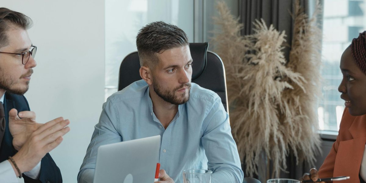 Investors collaborating to align their personal goals with market opportunities.