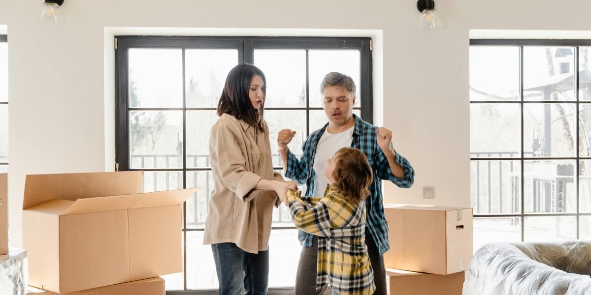A couple relaxes in a modern Connecticut home, embodying the sleek yet cozy design.