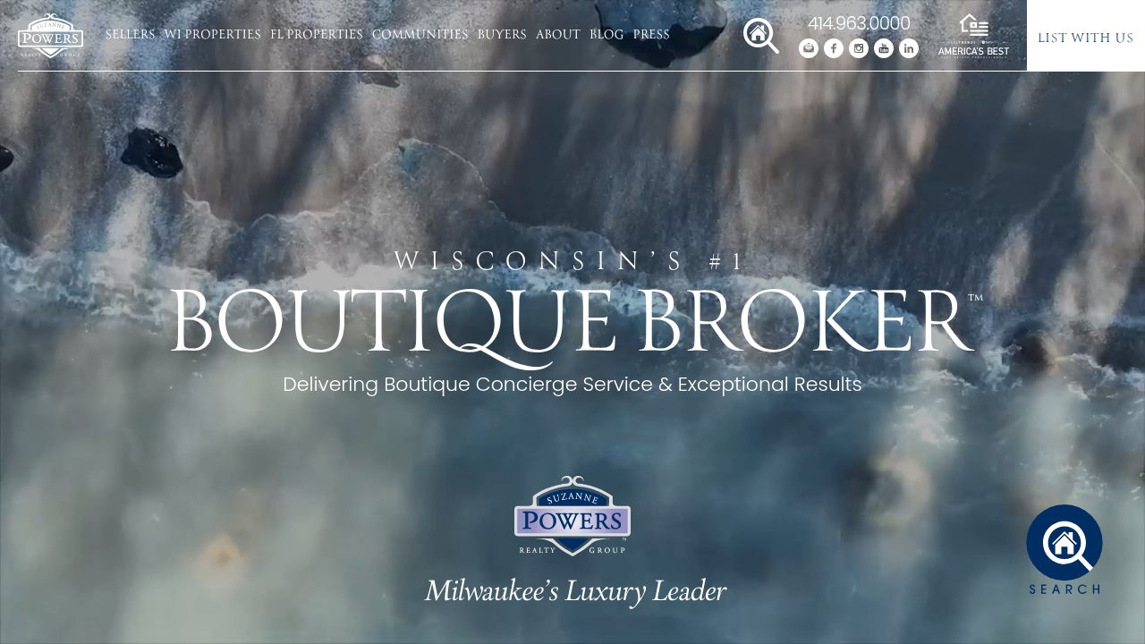 Screenshot of Powers Realty website, showcasing their specialization in luxury properties in Wisconsin.