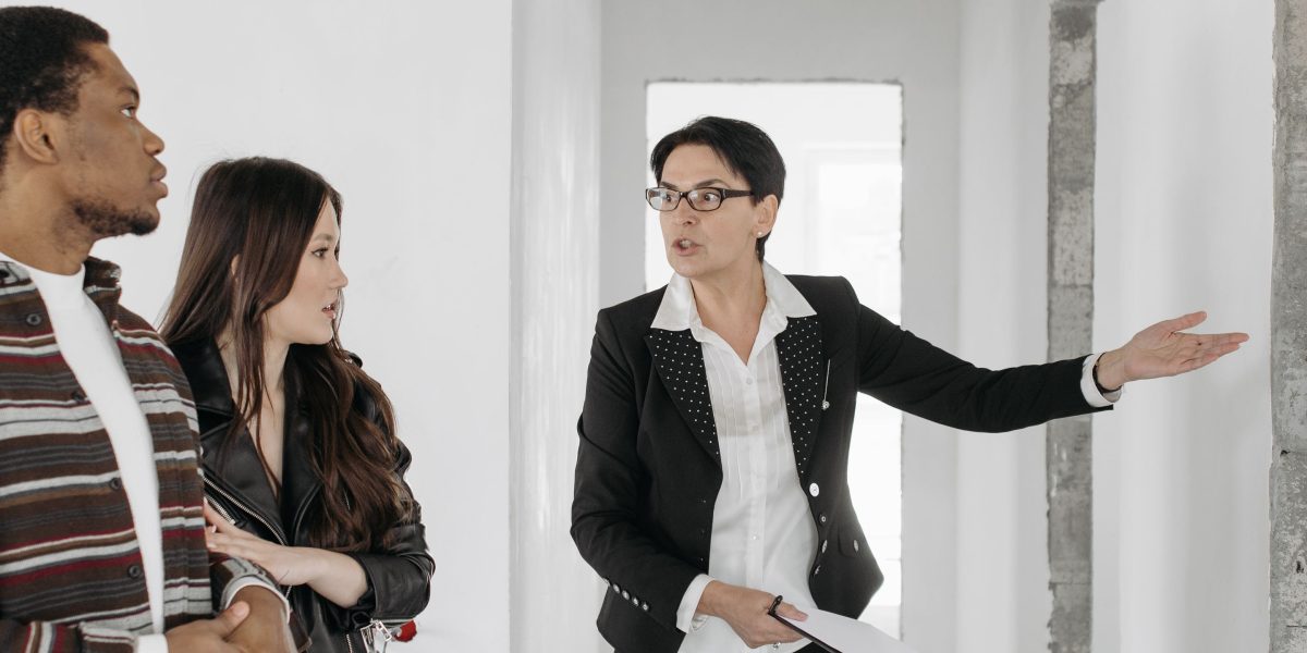 A couple confidently discussing their next big real estate investment, symbolizing the potential in the Texas luxury market.