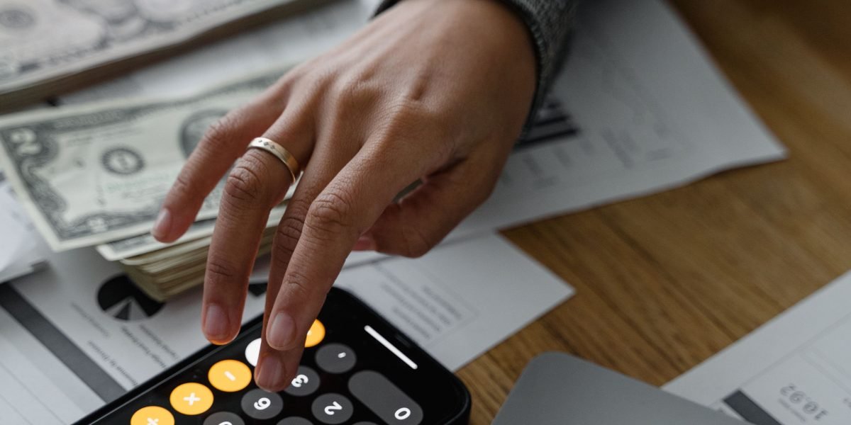 An investor thoughtfully considering different financial options, illustrating the decision-making process between Texas and Dubai real estate investments.