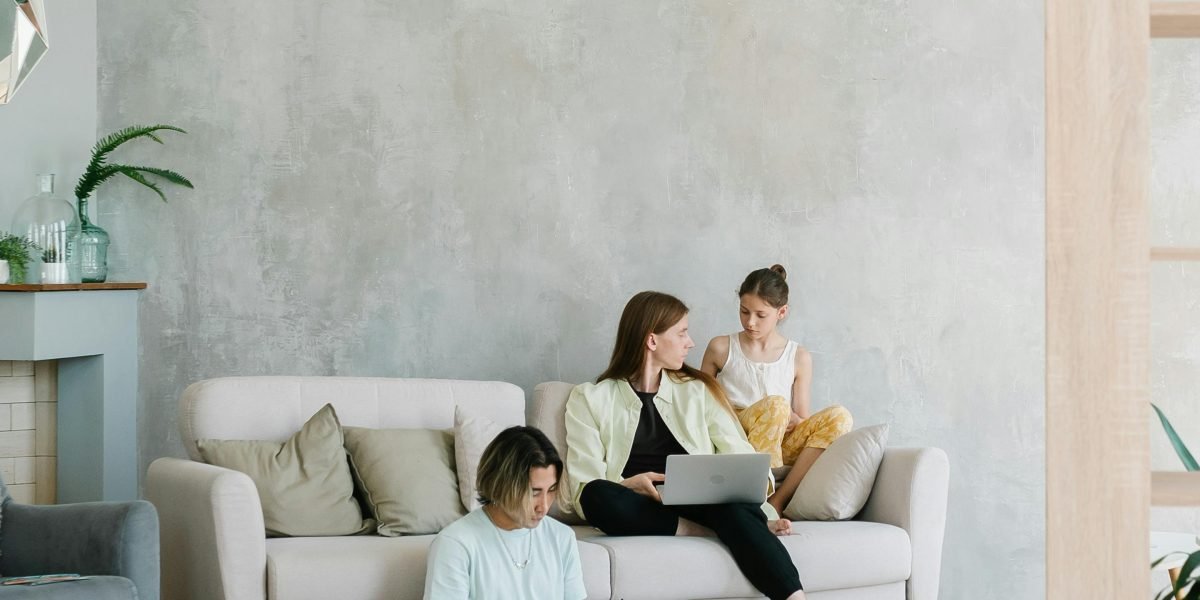 A family enjoying leisure time in a modern, luxurious home, reflecting the desired lifestyle.