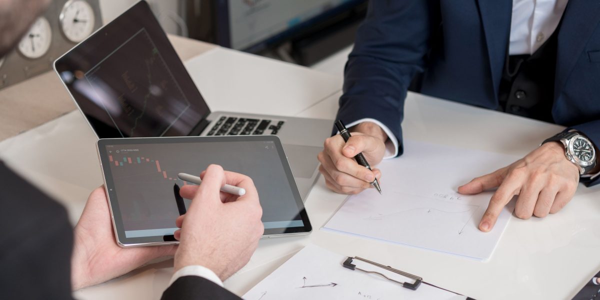 A client discusses investment opportunities and steps with a trusted real estate advisor.
