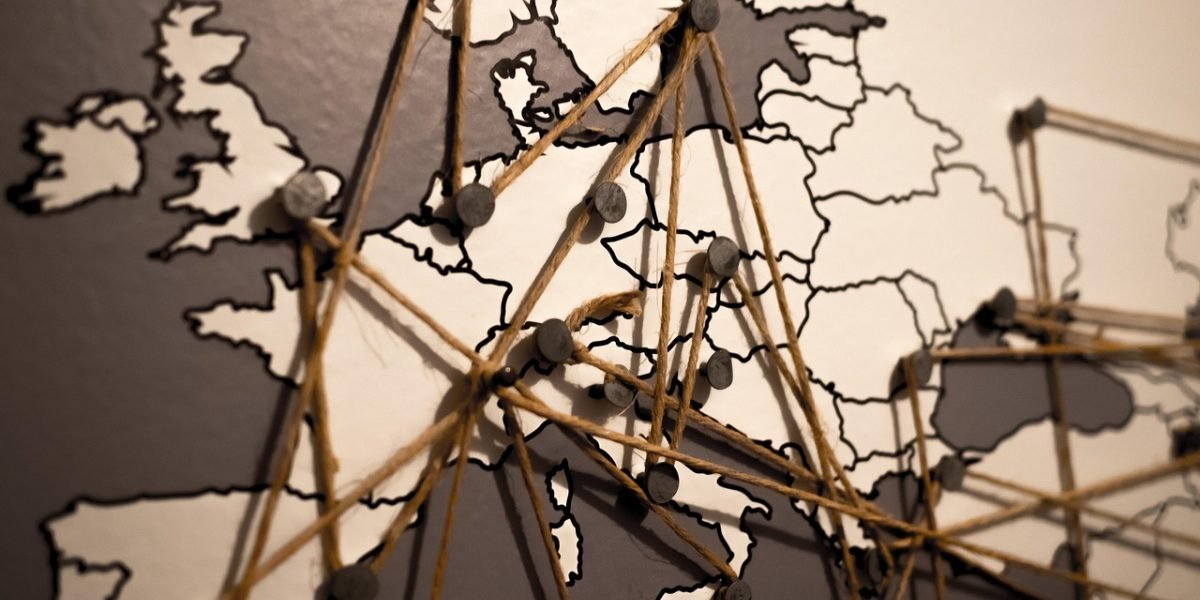 A high-net-worth investor reviews global market opportunities, contemplating expansion into the United States real estate market.