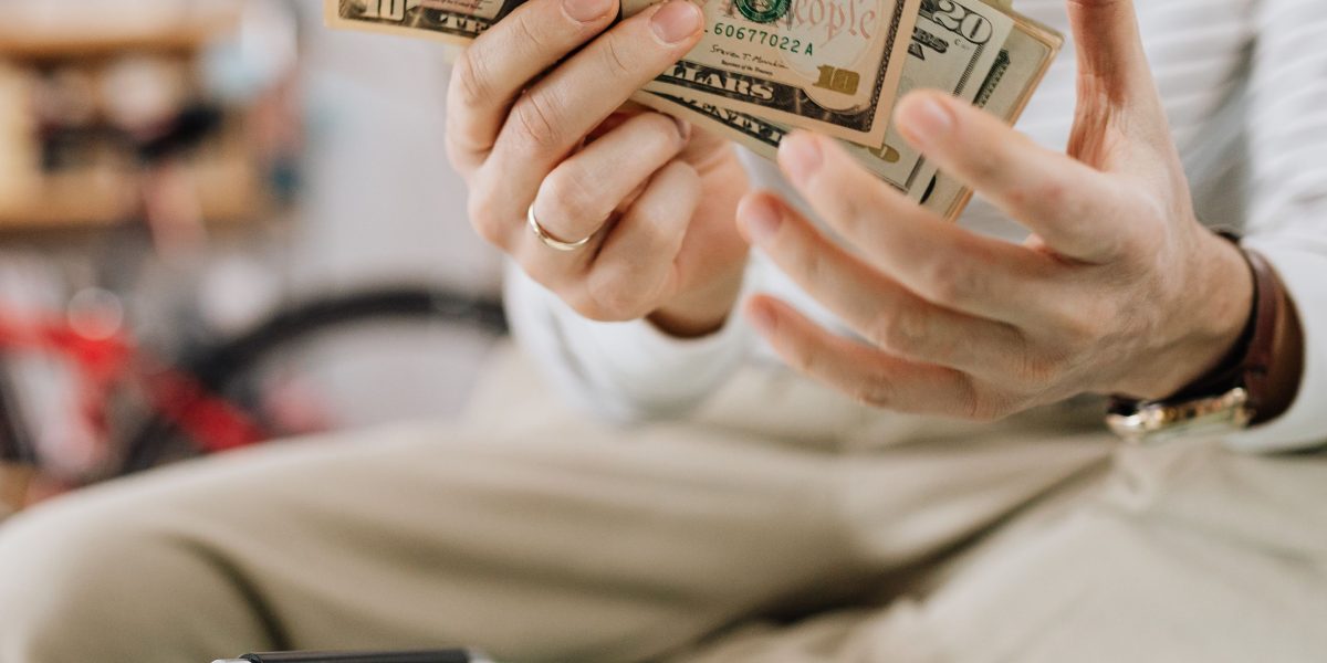 An individual confidently planning their investment portfolio for long-term wealth growth and diversification.