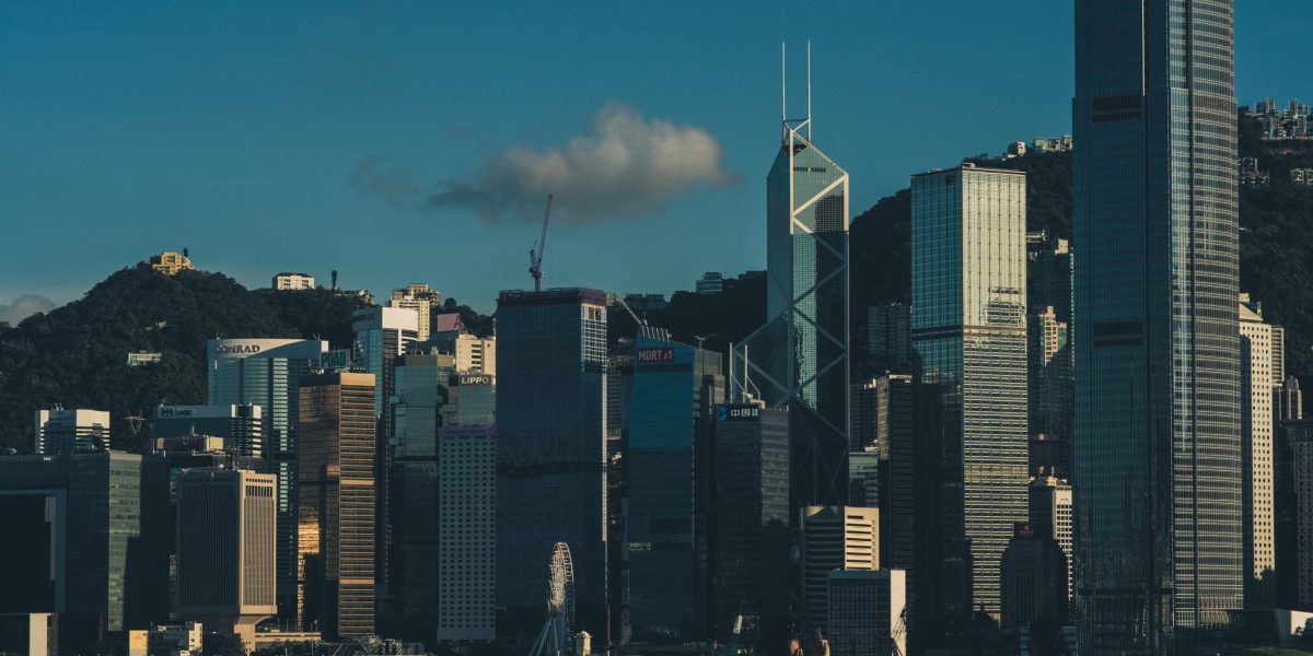 A buyer considering diverse international real estate markets, weighing the unique advantages of each.