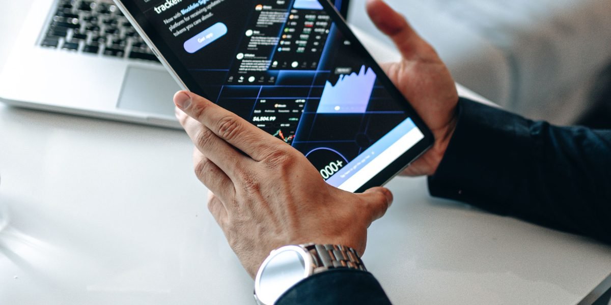 An individual meticulously planning their international real estate investment strategy.