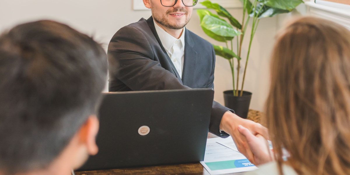 A financial advisor provides expert guidance to a client on complex investment decisions.