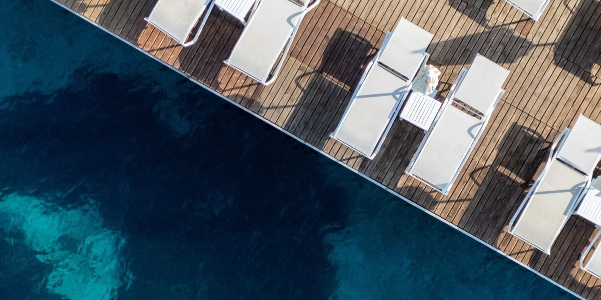 Embrace the serene luxury of waking up to ocean views in a modern beach house.