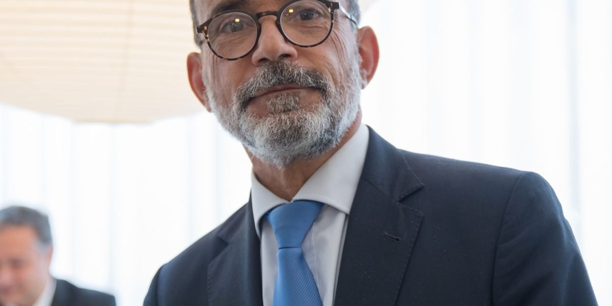 An executive investor confidently navigating opportunities in Dubai's luxury real estate market.
