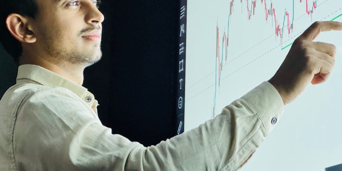 An investor reviews financial documents, planning for capital appreciation and future investment exit strategies.